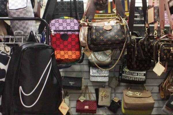 8. Imitations of luxury brand purses like Louis Vitton, Dior, Chanel and Prada are sold for R$200 in one of the biggest street markets of Brazil. Rio de Janeiro, Brazil, 2022.
